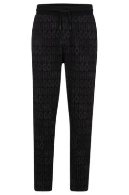 Cotton tracksuit bottoms with drawstring waist and monogram jacquard