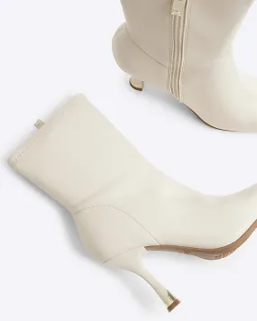 Cream Heeled Sock Boots