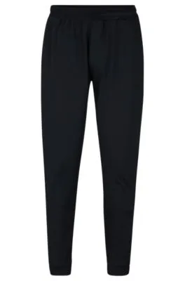 Cuffed tracksuit bottoms in active-stretch fabric