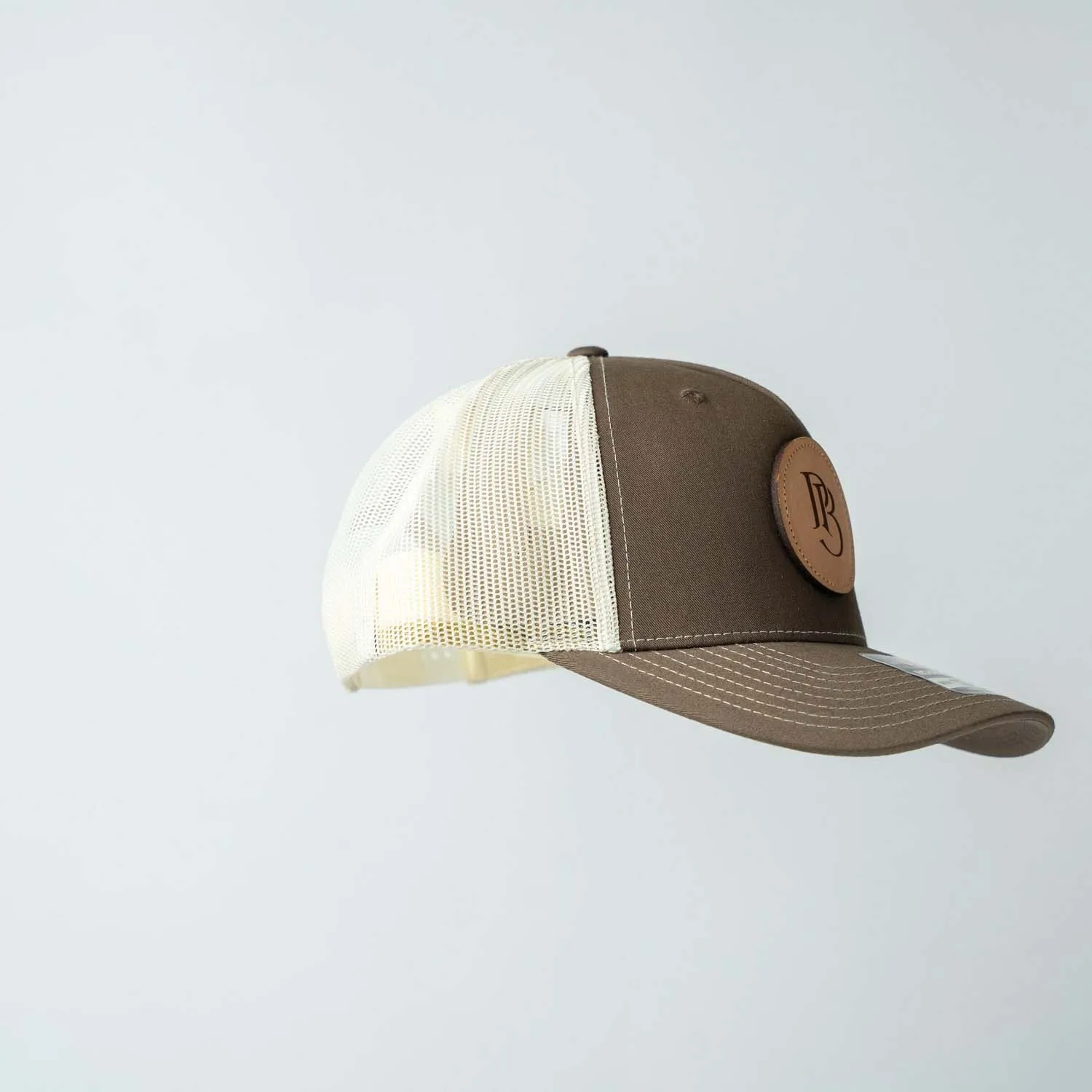 Trucker Hat | Chocolate Chip & Burch | Circular Monogram Logo Patch