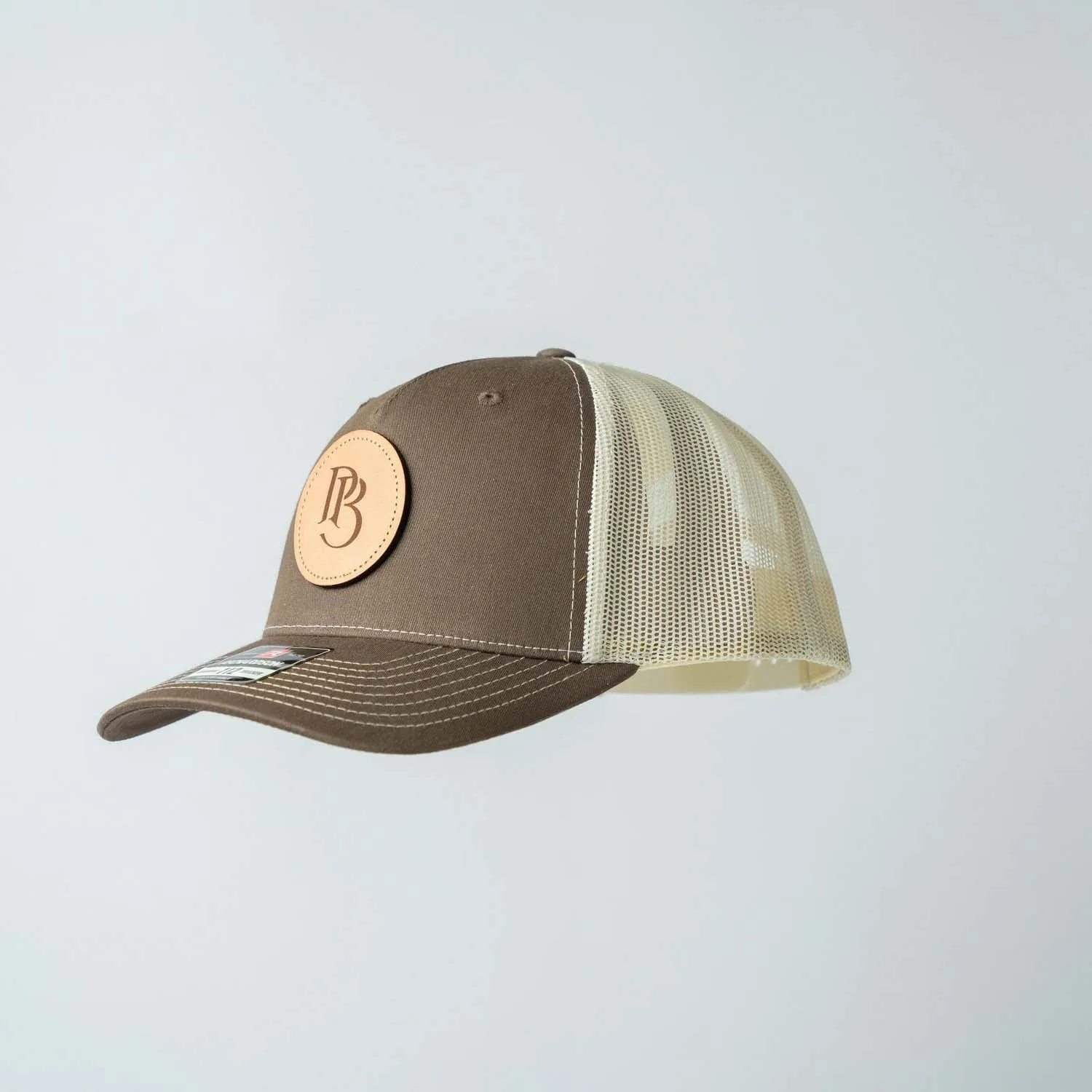 Trucker Hat | Chocolate Chip & Burch | Circular Monogram Logo Patch