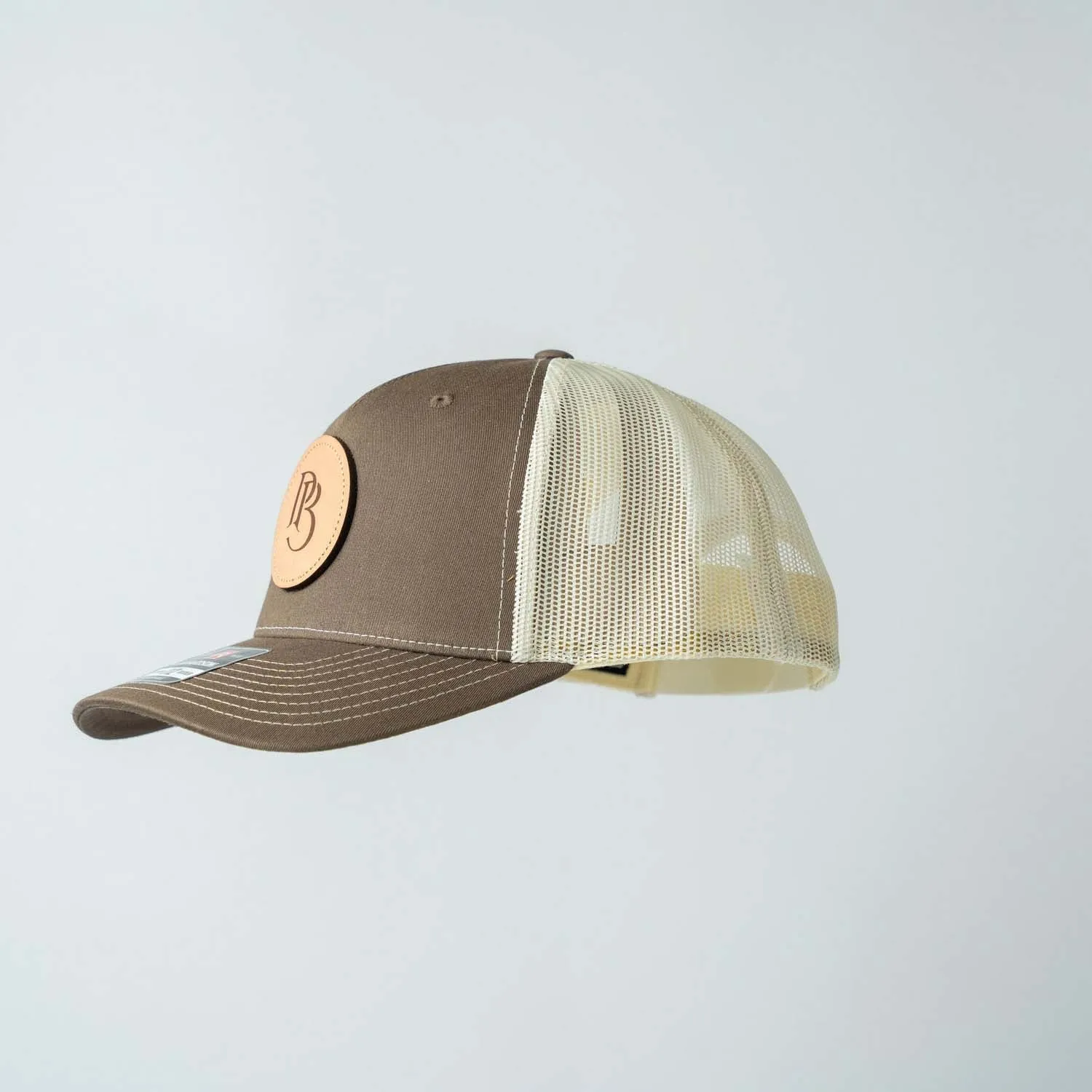 Trucker Hat | Chocolate Chip & Burch | Circular Monogram Logo Patch